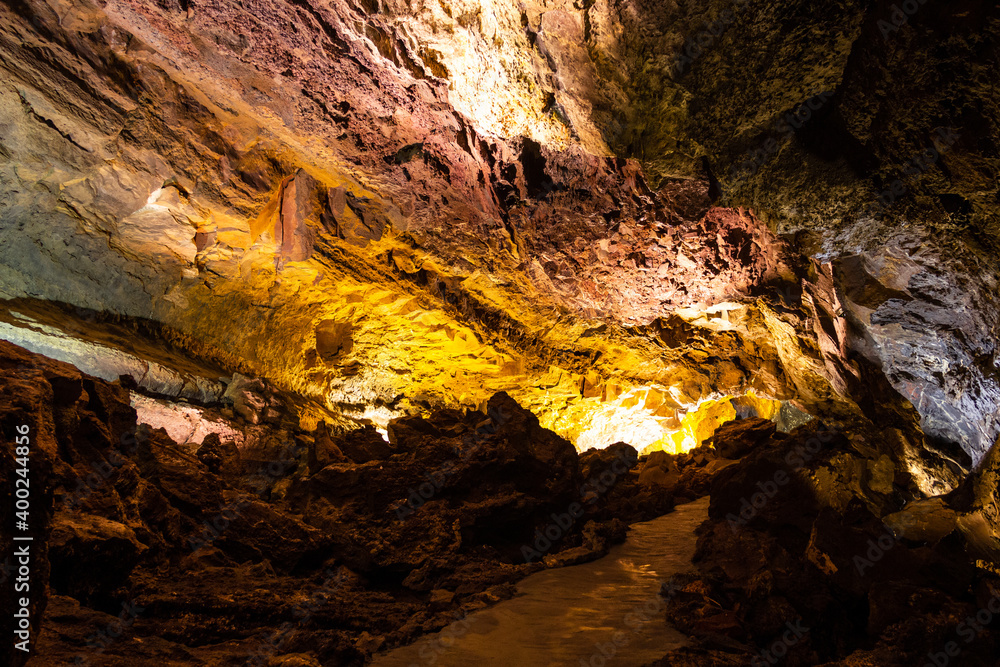 Cueva de Los Verdes lava tube illuminated in Lanzarote island, Spain. Geological cavern formation, tourist attraction concepts