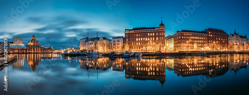 Helsinki, Finland. Panoramic View Of Kanavaranta Street With Uspenski Cathedral And Pohjoisranta Street In Evening Night Illuminations