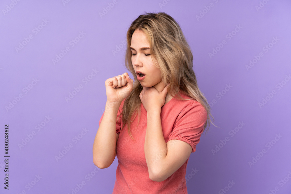 Teenager Russian girl isolated on purple background is suffering with cough and feeling bad Teenager Russian girl isolated on purple background is suffering with cough and feeling bad