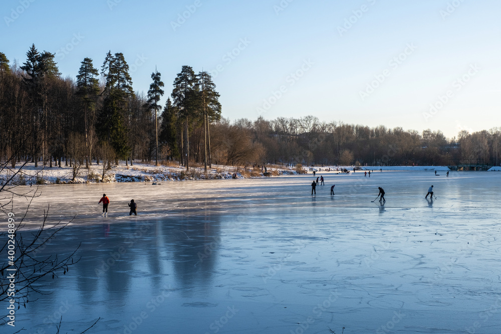 Ice skating on the first ice on the Talka river in Ivanovo. Ice skating on the first ice on the Talka river in Ivanovo.