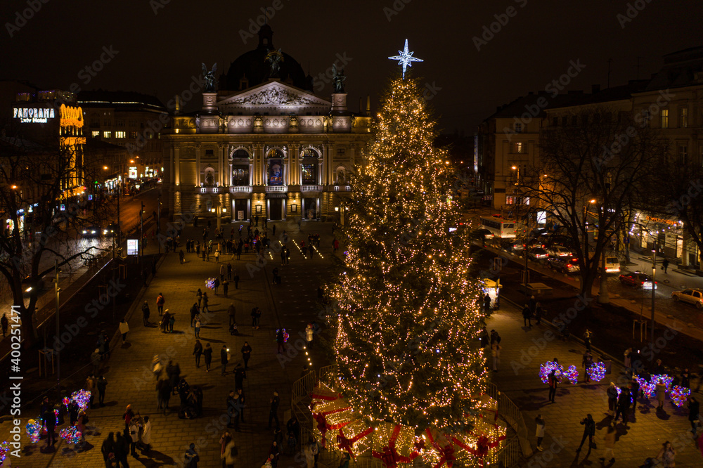 Opening of Christmas tree near Opera House in Lviv, Ukraine. View from drone