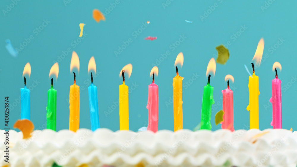 Birthday cake with candles on pastel color background Birthday cake with candles on pastel color background