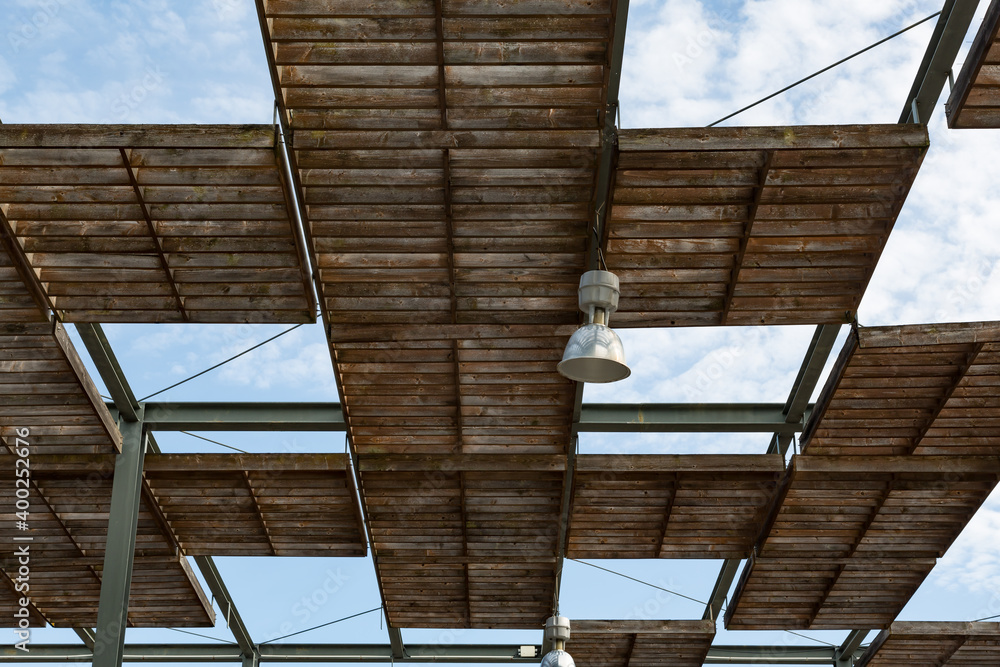 Stylish wooden shading roof in Lisbon's Parque das Nacoes, Portugal
