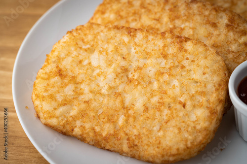 Bilde på lerret hash brown on white plate