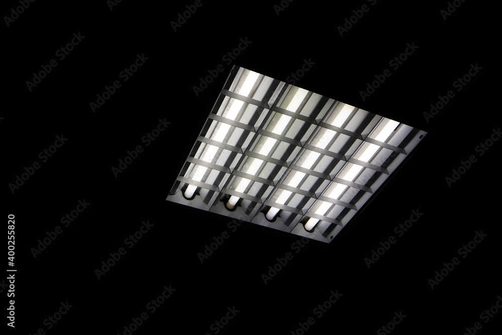 ceiling lamp with fluorescent lamps on a black background ceiling lamp with fluorescent lamps on a black background