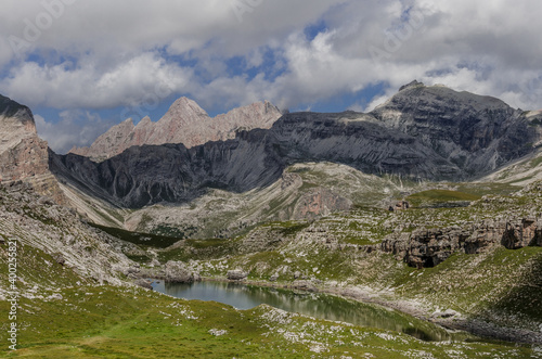 View of Crespeina lake, located west of Gardenacia plateau, as seen on High Route #2 from Puez refuge to Gardena valley, Puez-Odle Nature park, Dolomites, South Tirol, Italy.