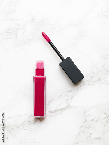 Lip gloss on marble background