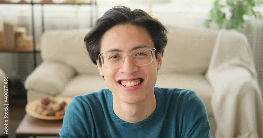 Portrait of man in eyeglasses smiling at home Portrait of man in eyeglasses smiling at home