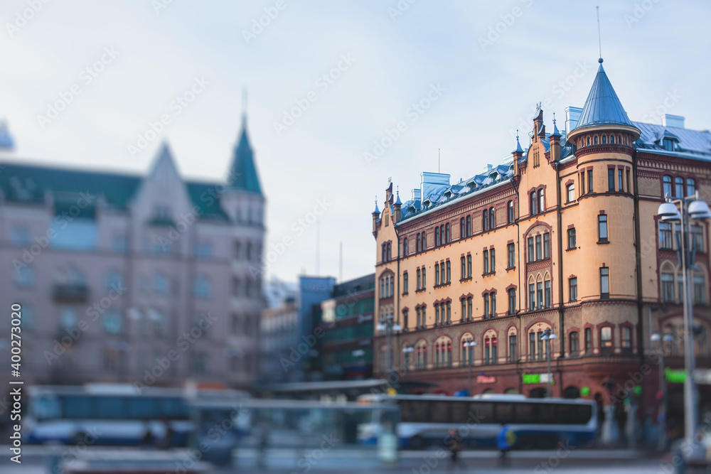 Fototapeta premium Streets of Tampere, Pirkanmaa, western part of Finland, vibrant winter city view, with town hall, church, and cathedral