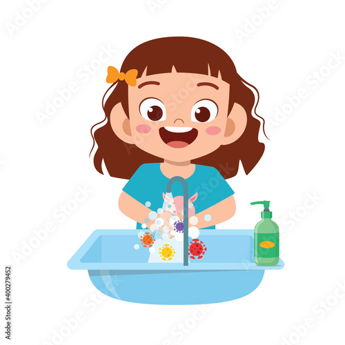 happy cute little kid girl wash hand in sink