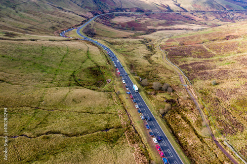 Aerial view of parked cars and congestion at Pen-y-Fan in the Brecon Beacons National Park in Wales, UK