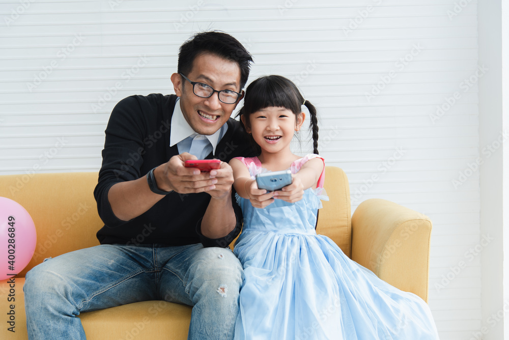 Relationship lifestyle asian family. Daddy teaching daughter and daddy playing happiness holidays Relationship lifestyle asian family. Daddy teaching daughter and daddy playing happiness holidays