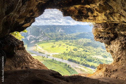 Cueva Ventana (Cave Window) overlooking the Río Grande de Arecibo valley, Cave Window is a large cave situated a top a limestone cliff in Arecibo, Puerto Rico.
 photo