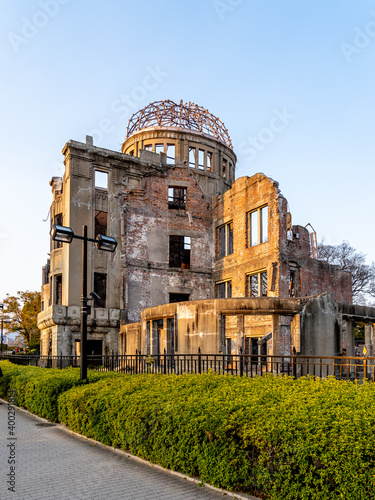 Atomic Bomb Dome at sunset, part of the Hiroshima Peace Memorial Park Hiroshima, Japan and was designated a UNESCO World Heritage Site.  photo