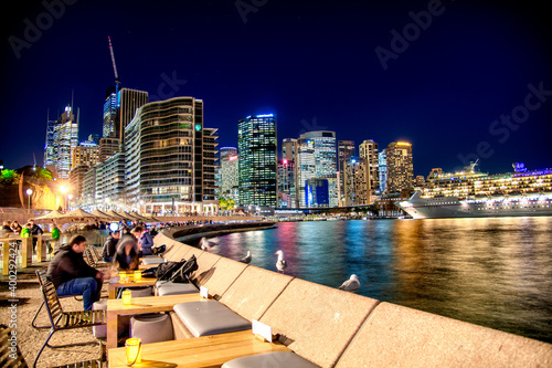 Photography SYDNEY - AUGUST 20, 2018: Night reflections of Sydney Harbour and city skyline