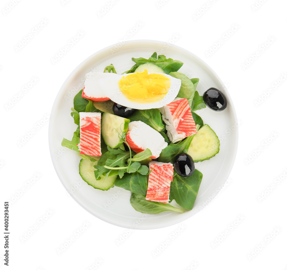 Delicious crab stick salad isolated on white, top view