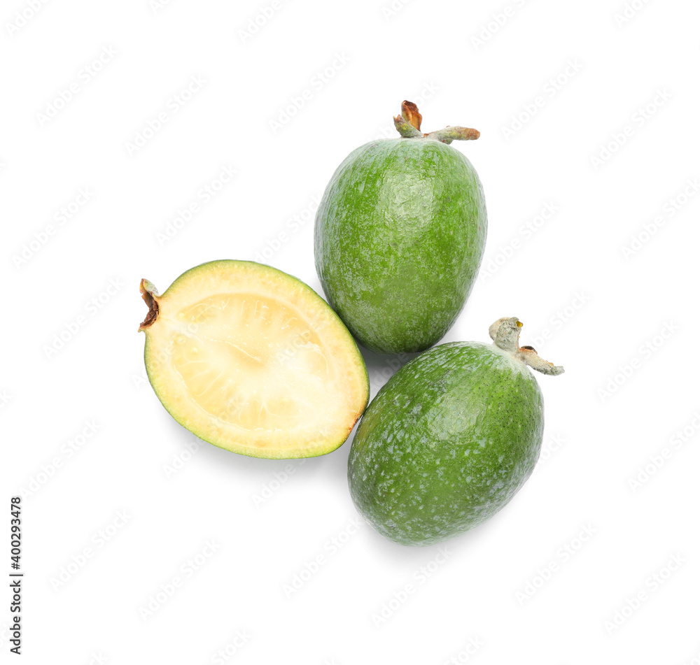 Cut and whole feijoas on white background, top view Cut and whole feijoas on white background, top view