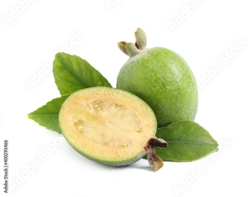 Whole and cut feijoa fruits on white background photo