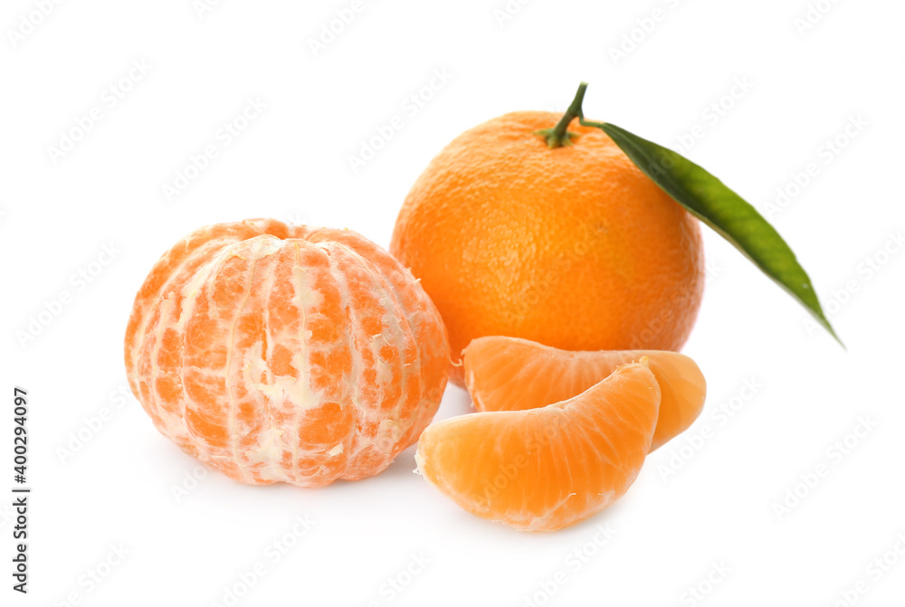 Fresh tangerines with green leaf on white background Fresh tangerines with green leaf on white background