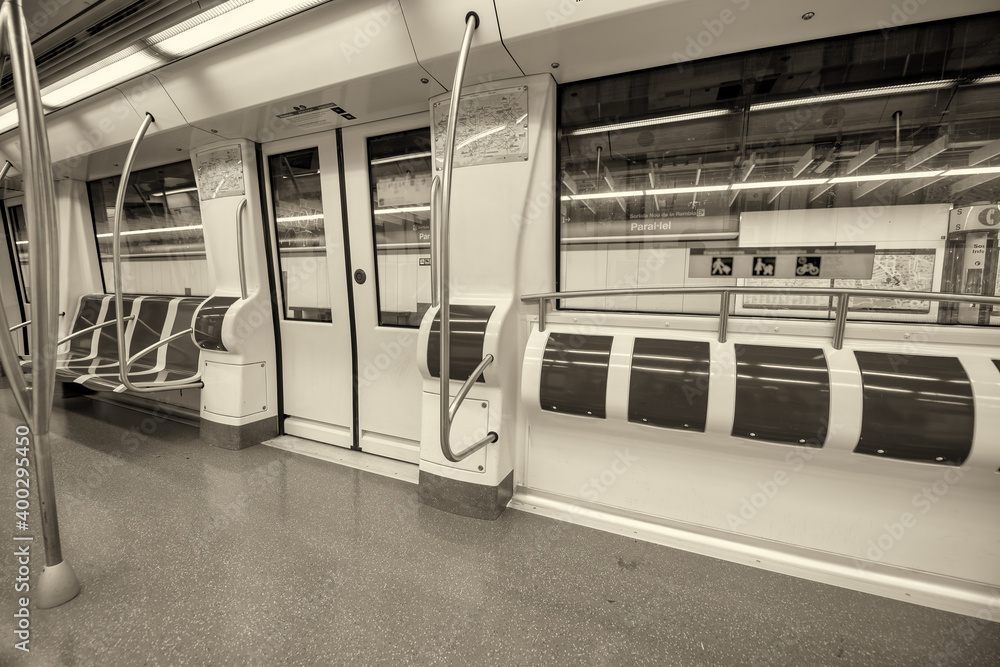 Interior of subway train with empty seats. Interior of subway train with empty seats.