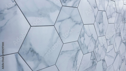 Kitchen backsplash just installed with hexagon marble, ceramic tiles