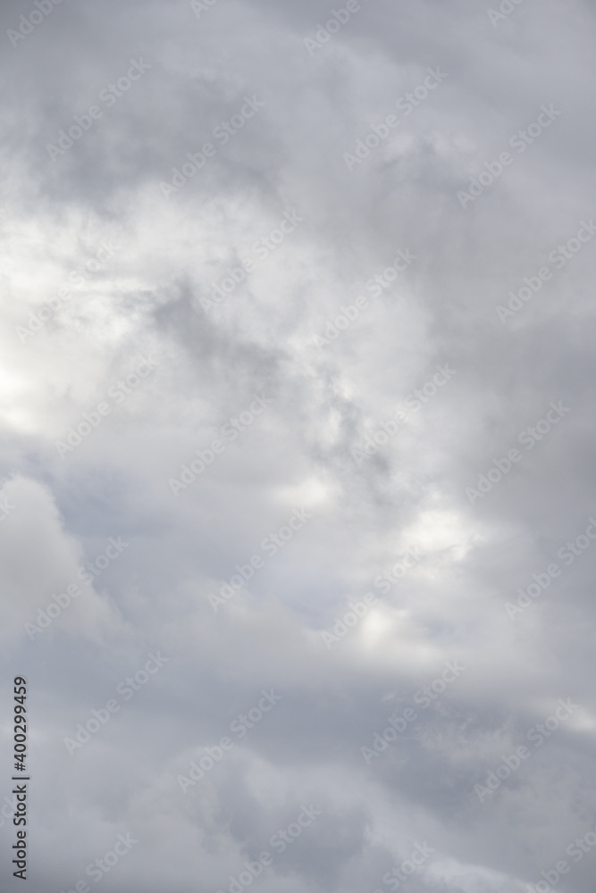 Fototapeta premium Dramatic stormy sky in shades of gray and white, as a nature background 