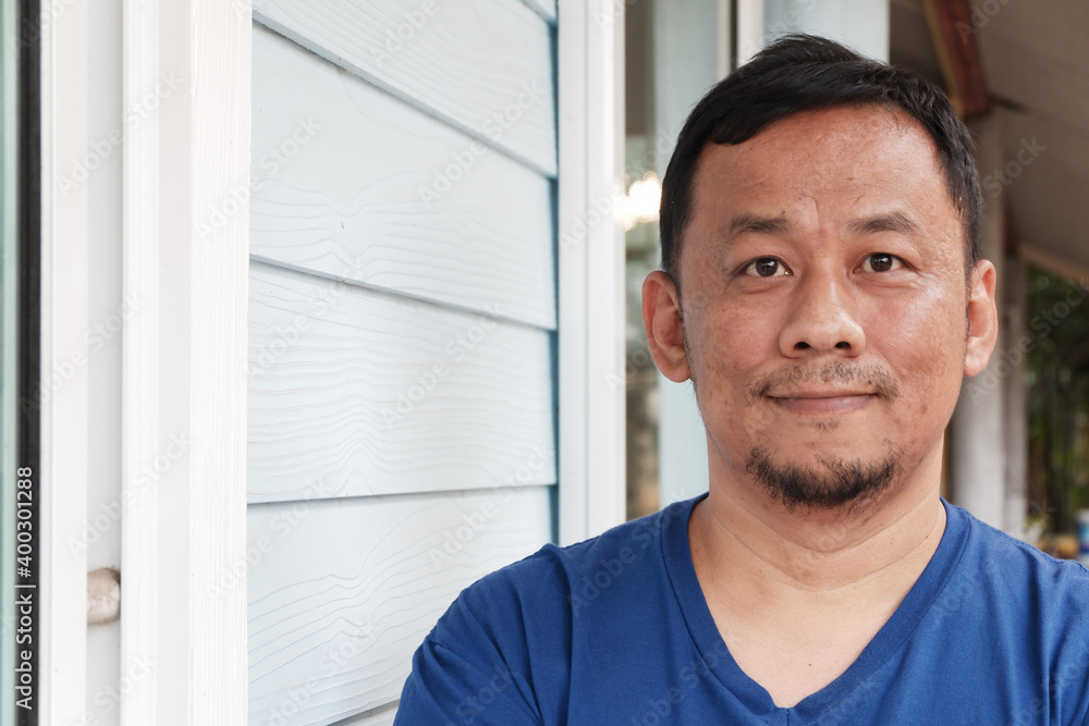 Fototapeta premium portrait of a middle aged man Looking forward and smile 