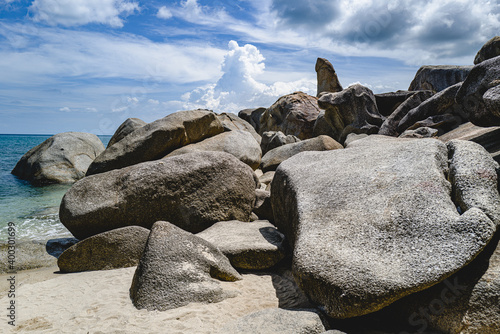 Beautiful view of Grand Mother and Grand Father Rock with blue sky backgroung in Koh Samui Thailand. Granite Rock on beachside.