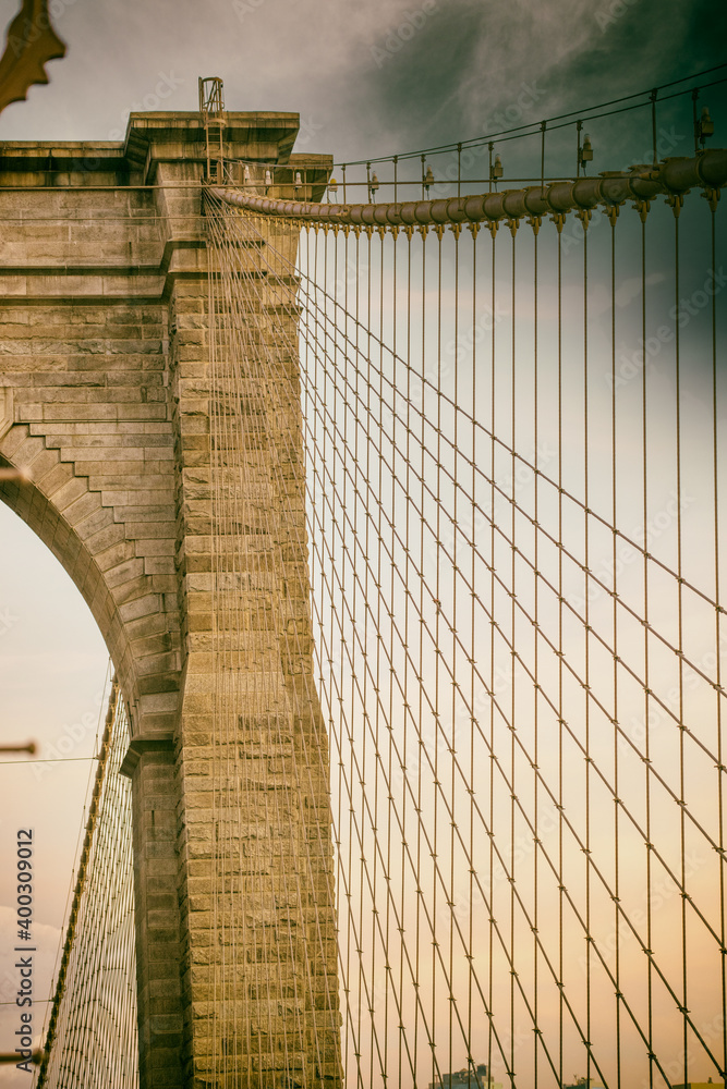 Fototapeta premium Sky colors on the background of Brooklyn Bridge Tower, New York City