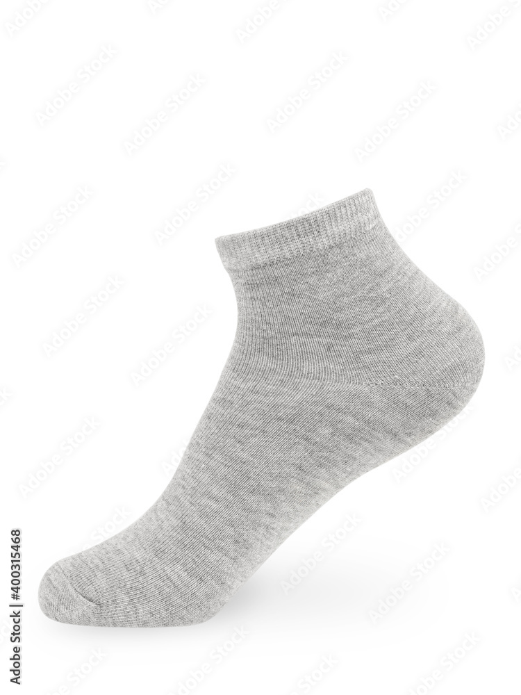 Isolated gray short sock on invisible mannequin foot on white background, side view Isolated gray short sock on invisible mannequin foot on white background, side view
