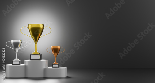 Winners podium with cups. Gold, Silver, and Bronze on dark background. Trophies with stand. 3d rendering.