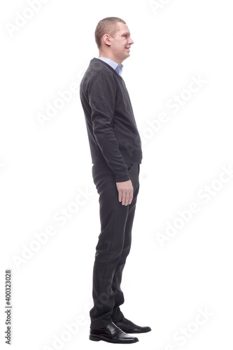 Full length profile portrait of a man standing on white background