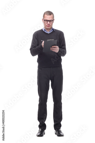 Attractive middle-aged man writing on clipboard