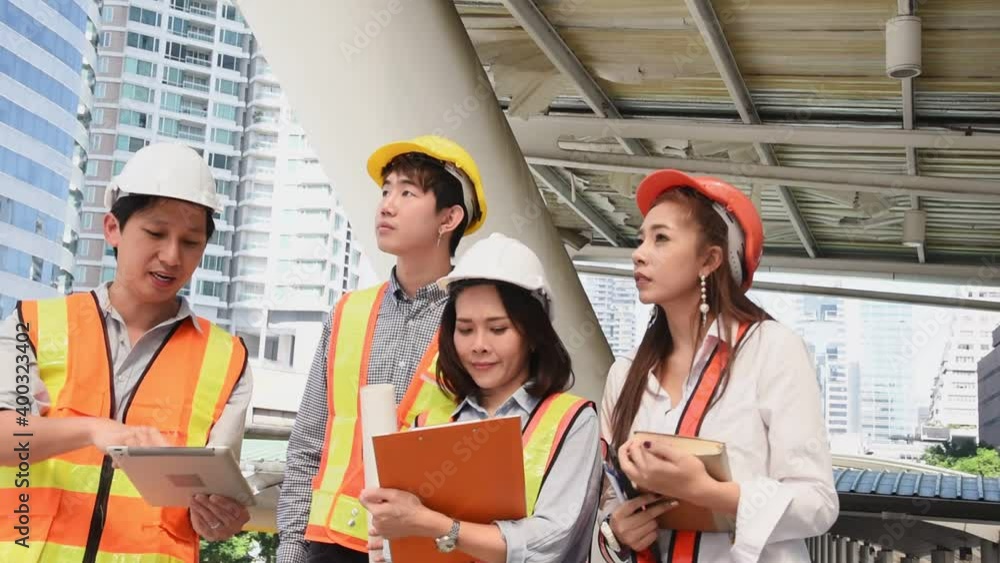 Group of civil engineer team with safety protection in work site area meeting to discuss and planning detail Group of civil engineer team with safety protection in work site area meeting to discuss and planning detail
