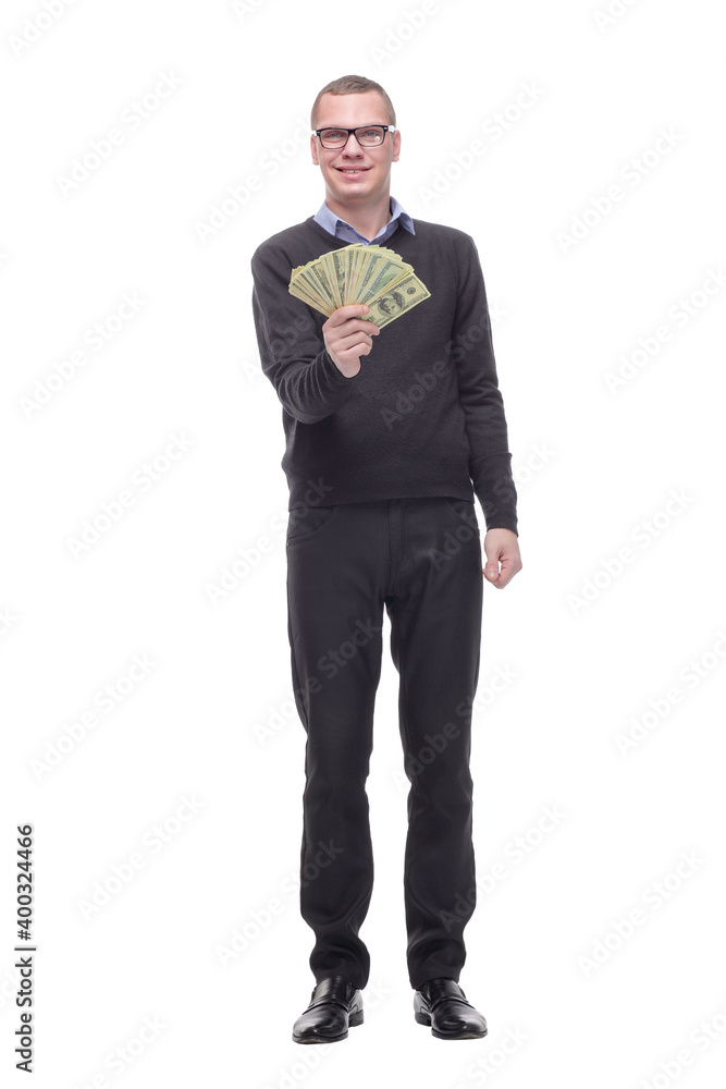 Smiling business man in black clothes holding money in hand and looking at camera Smiling business man in black clothes holding money in hand and looking at camera