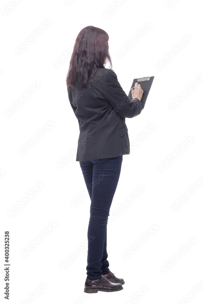 Back view of business woman writing on clipboard Back view of business woman writing on clipboard