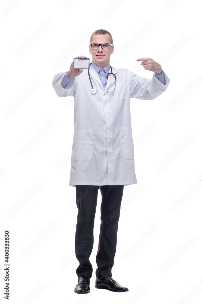 Young smiling doctor holding business blank card Young smiling doctor holding business blank card