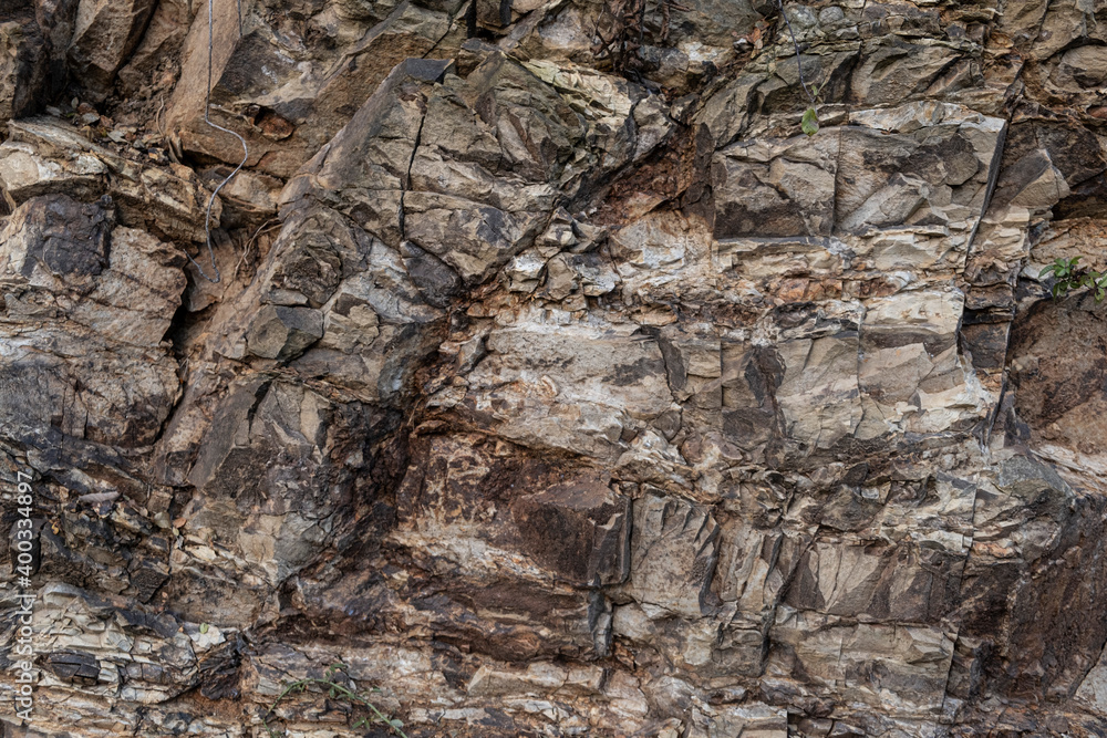 Cracked rocks, shale stone rock texture closeup Cracked rocks, shale stone rock texture closeup