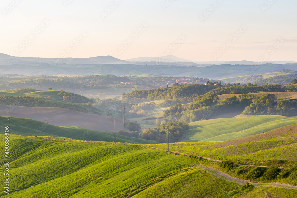 Rolling landscape with morning fog in the valley