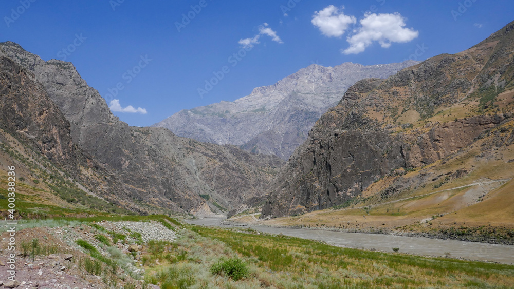 Beautiful landscape view of the Panj river valley bordering Afghanistan in Darvaz district, Gorno-Badakshan, the Pamir region of Tajikistan Beautiful landscape view of the Panj river valley bordering Afghanistan in Darvaz district, Gorno-Badakshan, the Pamir region of Tajikistan