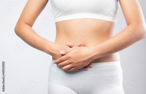 Wallpaper Mural woman touch with Stomach ache with Health Torontodigital.ca