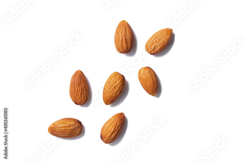 Almonds floating pieces on white isolated .almond  Image stack Full depth of field macro shot