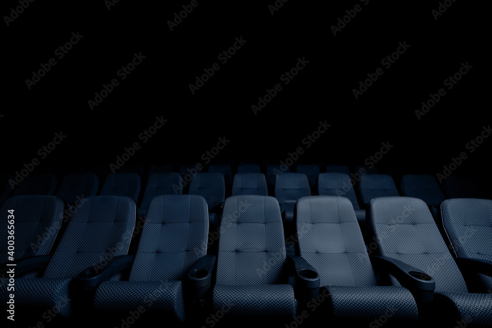 Fototapeta premium The cinema hall is empty, new blue seats in the auditorium or cinema