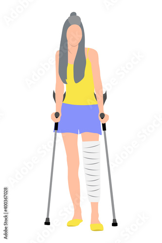 A beautiful girl with long hair in a yellow T-shirt and blue shorts with a cast on her leg and crutches in her hands. Disability concept, physical injury. Broken leg, trauma