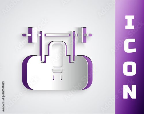 Paper cut Bench with barbel icon isolated on grey background. Gym equipment. Bodybuilding, powerlifting, fitness concept. Paper art style. Vector.