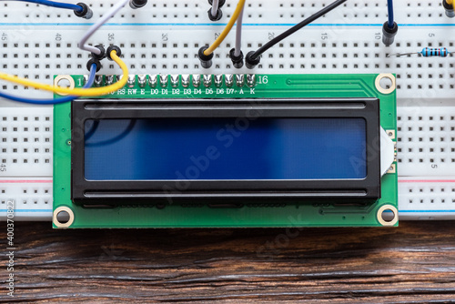 фотографія Liquid crystal display with copy space on the breadboard close up