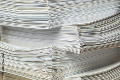 bundles bales of paper documents. stacks packs pile on the desk in the office