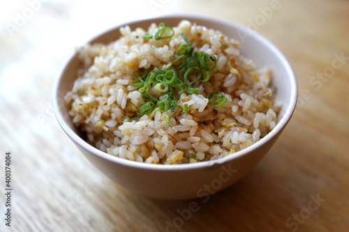 Close up a bowl of Japanese garlic fried rice