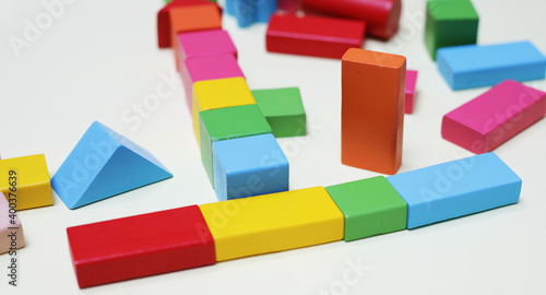 Developing colorful cubes for children. Wooden constructor. Children's toy for the development of children.