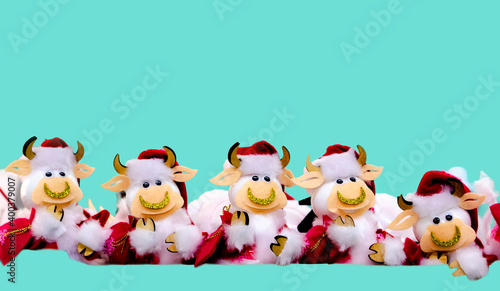 Christmas tree toy bull in the year 2021 year of the white bull there is a place for congratulations